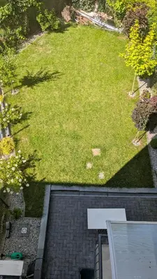 an aerial view of a yard with a grassy field at Centrum BAL Apartment in Kraków