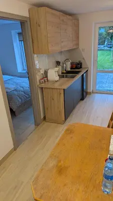 a kitchen with a sink and a counter top at Centrum BAL Apartment in Kraków