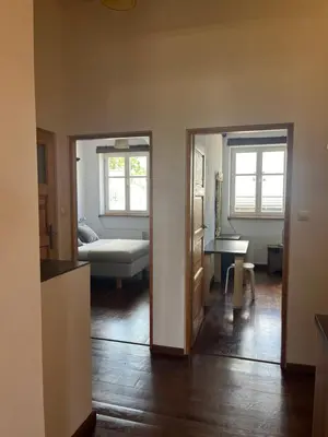 a living room with a couch and a table at Native Apartments Sobieskiego 19 in Kraków