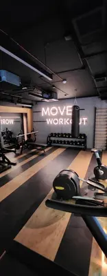 a gym with a moving work out equipment in a room at Luxury River Side apartament, Free parking in Kraków