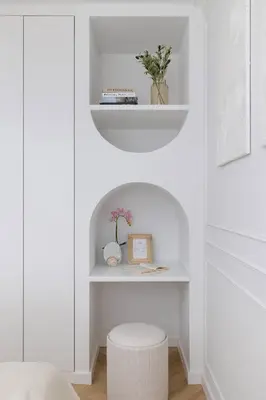 a white room with a white shelf and a stool at Prandoty Stylish Apartment with Balcony & Parking in Cracow Old Town by Renters Prestige in Kraków