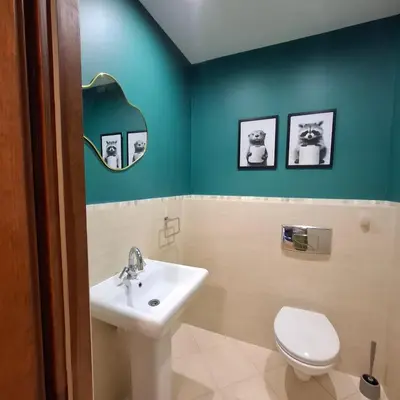 a bathroom with a sink and a toilet at Apartamenty TUTERRA III in Zabagnie