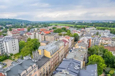 an aerial view of a city with buildings at Kraszewskiego Apt - Balcony, Park & River nearby - by Rentujemy in Kraków