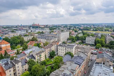 an aerial view of a city with buildings at Kraszewskiego Apt - Balcony, Park & River nearby - by Rentujemy in Kraków