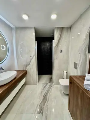 a bathroom with a sink and a toilet and a shower at The Velvet Apartment Kościuszki in Kraków