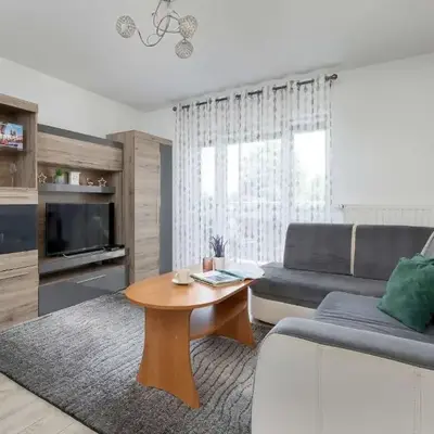 Modern Apartment with a Balcony in a Quiet Estate by Noclegi Renters
