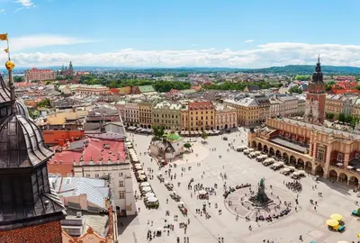 an aerial view of a city with a large plaza at Old Town Kraków by Downtown Apartments in Kraków