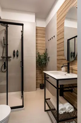 a bathroom with a shower and a sink at Old Town Kraków by Downtown Apartments in Kraków