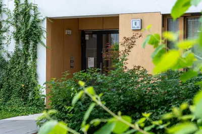 an entrance to a building with a door at Apartament Orawska U Pana Cogito in Kraków