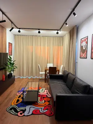 a living room with a couch and a table at Novum Escape in Kraków