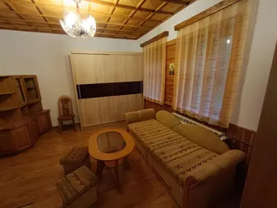 a living room with a couch and a table at Apartament Żmiąca in Jaworzna