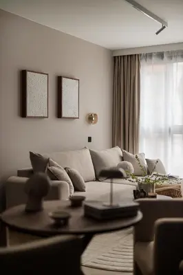 a living room with a couch and a table at High Line by A11 in Kraków