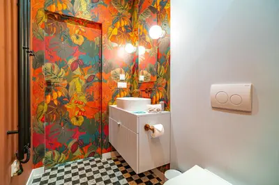 a bathroom with a toilet and a colorful wallpaper at Bosacka Apt - Top Location, Old Town nearby - by Rentujemy in Kraków