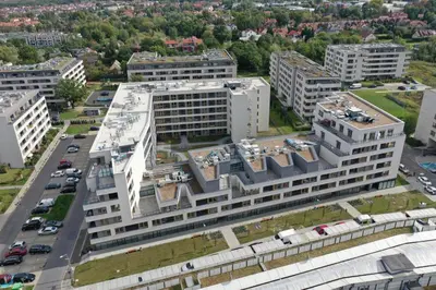 an aerial view of a large white building at Piltza House in Kraków