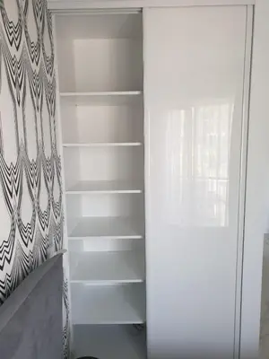 a white closet with a glass door in a room at Apartment Cracow Old Town in Kraków