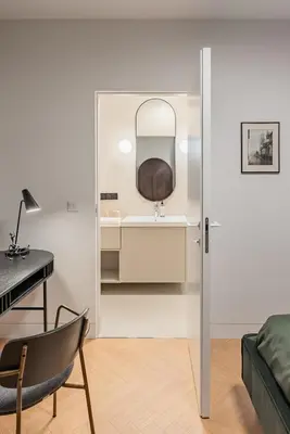a living room with a couch and a glass table at Wawel z Balkonu - Apartament Premium, bezpłatny parking, szybkie Wifi in Kraków