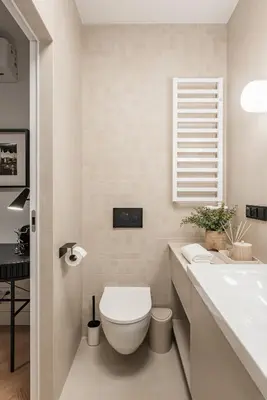 a bathroom with a toilet and a sink at Wawel z Balkonu - Apartament Premium, bezpłatny parking, szybkie Wifi in Kraków