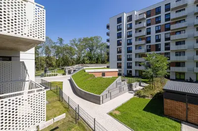 a view of the courtyard of a building at Wybickiego Stylish Apartments with Parking and Air Conditioning in Cracow by Noclegi Renters in Kraków