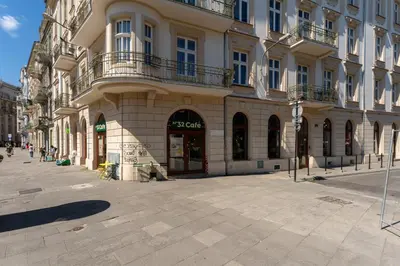 a large building on a street in a city at Morsztynowska Studio with Mezzanine by BookingHost in Kraków