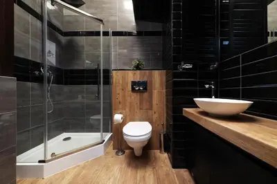 a bathroom with a toilet and a sink and a shower at Krupnicza 10 by Homeprime in Kraków