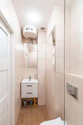 a bathroom with a sink and a shower at Straszewskiego view in Kraków