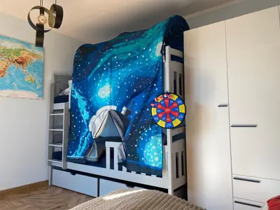 a bedroom with a star wars mural on the wall at Sielsko Anielsko Apartament in Zawoja
