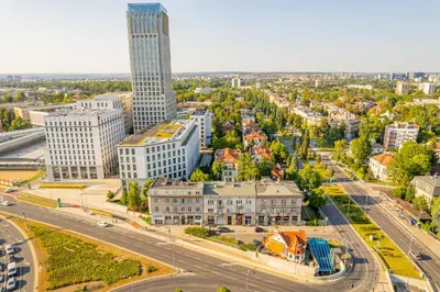 an aerial view of a city with a tall building at Grzegorzki Apt - 55m2, Balcony - by Rentujemy in Kraków