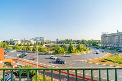 a view of a street with cars on a highway at Grzegorzki Apt - 55m2, Balcony - by Rentujemy in Kraków