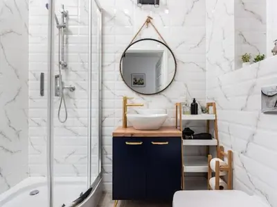 a bathroom with a sink and a mirror and a tub at Nowoczesny apartament nad Wisłą in Kraków
