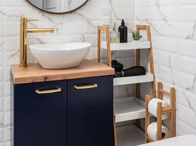 a bathroom with a sink and a bowl on a counter at Nowoczesny apartament nad Wisłą in Kraków