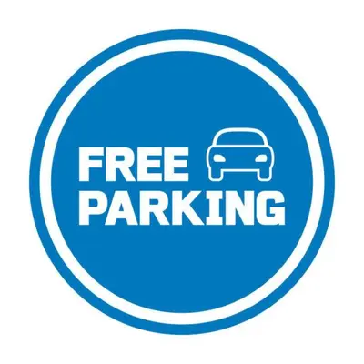 a free parking sign with a car in a circle at Rakowicka Residence Parking Balkon By Hosty in Kraków