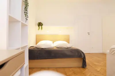 a white drawer with silver utensils at Nowy Kleparz 102 m2 with 3 Separate Bedrooms in Kraków