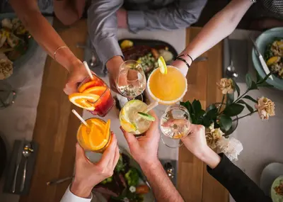 a group of people holding up their drinks at Hotel Szary Residence in Michałowice