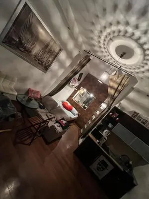 an overhead view of a living room with a couch at Lets go in Kraków