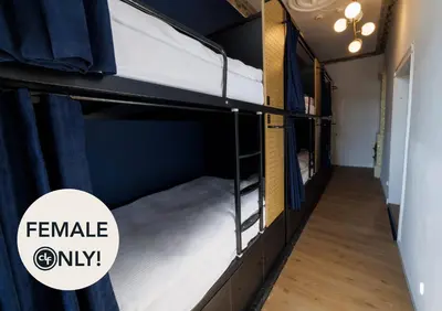 a couple of bunk beds in a room at dreamfactory - Hostel Krakow in Kraków