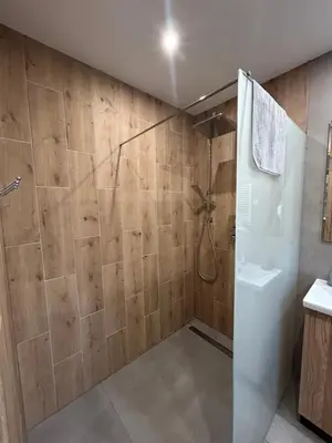 a bathroom with a shower and a toilet at 4 Żywioły-Noclegi w Beskidach basen sauna jacuzzi in Koziniec