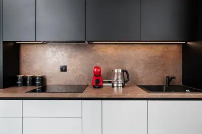 a kitchen with a red appliance on a counter at City of the Kings - Eden Apartment in Kraków