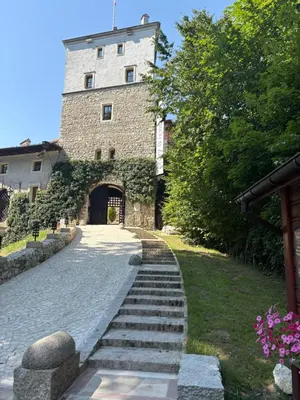 a large stone building with stairs leading up to it at Korzkiewka in Korzkiew