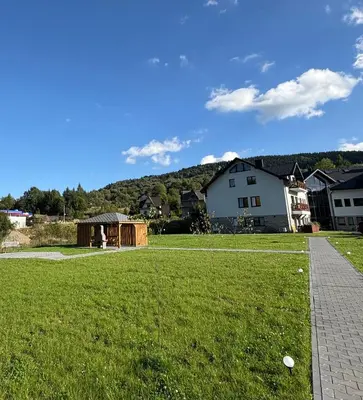 a view of a yard with a gazebo at Babia Perła Zawoja in Zawoja