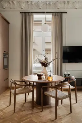 a dining room with a table and chairs at Noble Apartment in Kraków