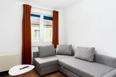 a kitchen with a refrigerator and a window at Sewera Cozy Nest Apartment by BookingHost in Kraków