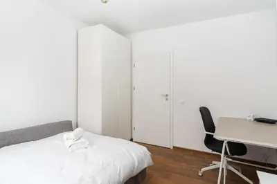 a living room with a couch and a window at Sewera Cozy Nest Apartment by BookingHost in Kraków