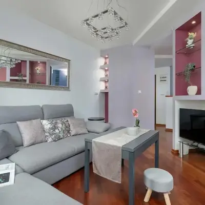 Grey and Pink Two Bedroom Apartment in Cracow with Parking