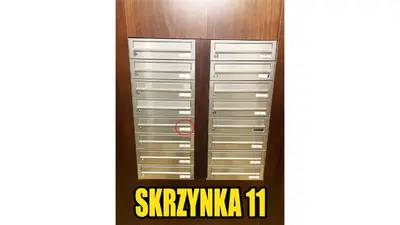 a pair of metal lockers with a sign on it at Apartament Lea in Kraków