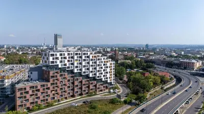 an aerial view of a building and a highway at Cracow Novum Apartments by BookingHost in Kraków