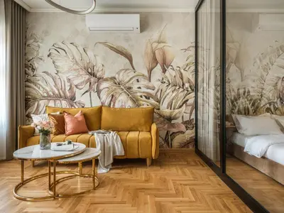 a bedroom with a bed and a wall mural at Art Palace - Fragola Apartments in Kraków