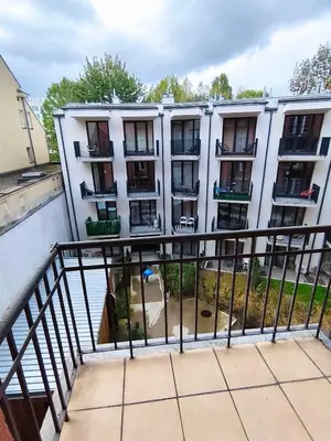 an apartment building from the balcony of a building at Krakow City Stay Vintage in Kraków