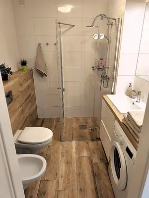 a bathroom with a shower and a toilet and a sink at Old Town Retreat Cracow in Kraków