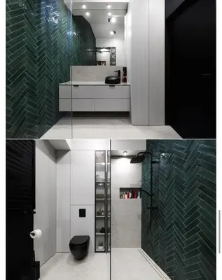 a bathroom with a green and white patterned wall at M&D Apartment in Kraków
