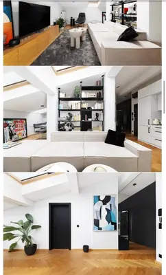 a living room with white furniture and a white couch at M&D Apartment in Kraków